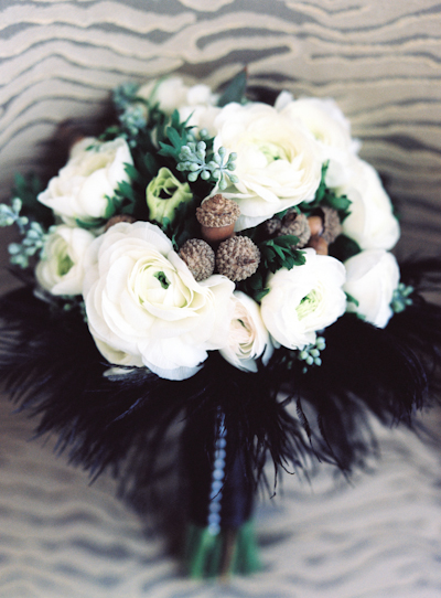 white ranunculus, black feathers